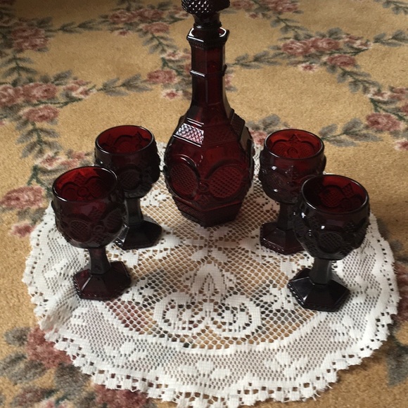 Vintage Avon Cape Cod collection wine decanter w/four wine glasses.